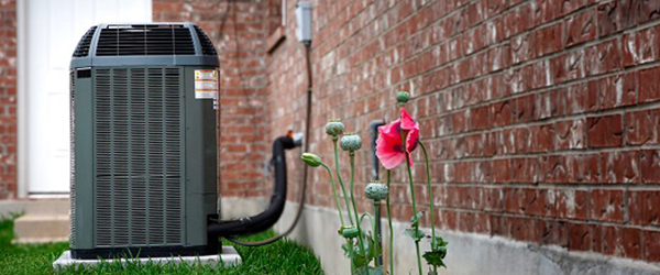 AC Unit outside a brick home