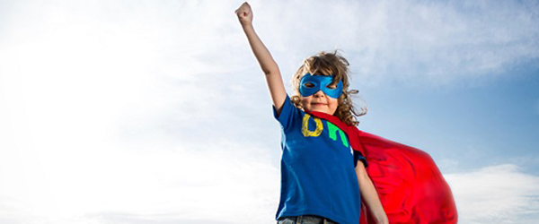 Child dressed as super hero